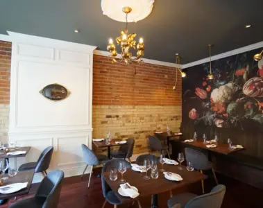 Warm dining room inside Avelo vegan restaurant in Toronto