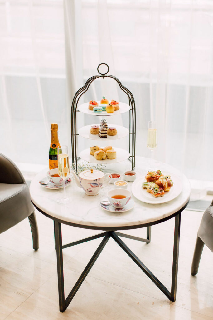 Afternoon tea tiers and teacups in the Shangri-La Toronto Lobby Lounge