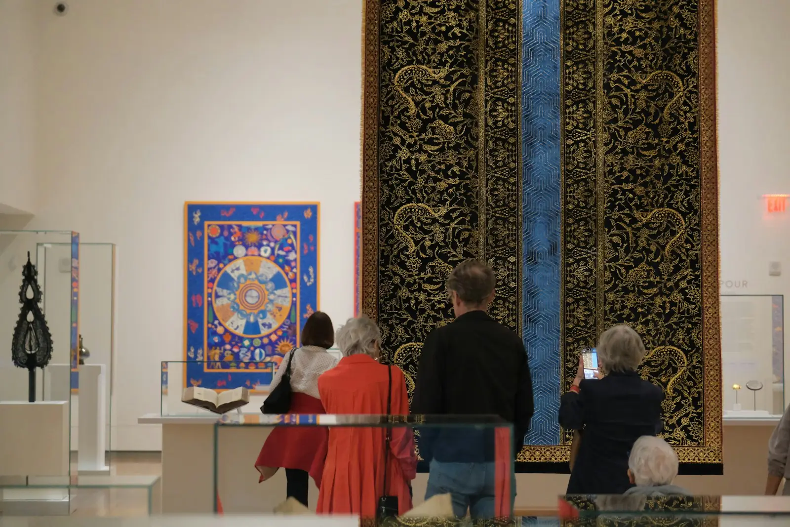 Visitors looking at art inside the Aga Khan Museum in Toronto