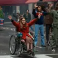 Judith Heumann supporters stop traffic in a scene from Being Heumann