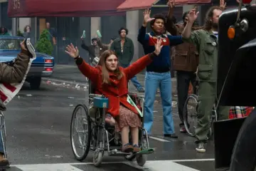Judith Heumann supporters stop traffic in a scene from Being Heumann