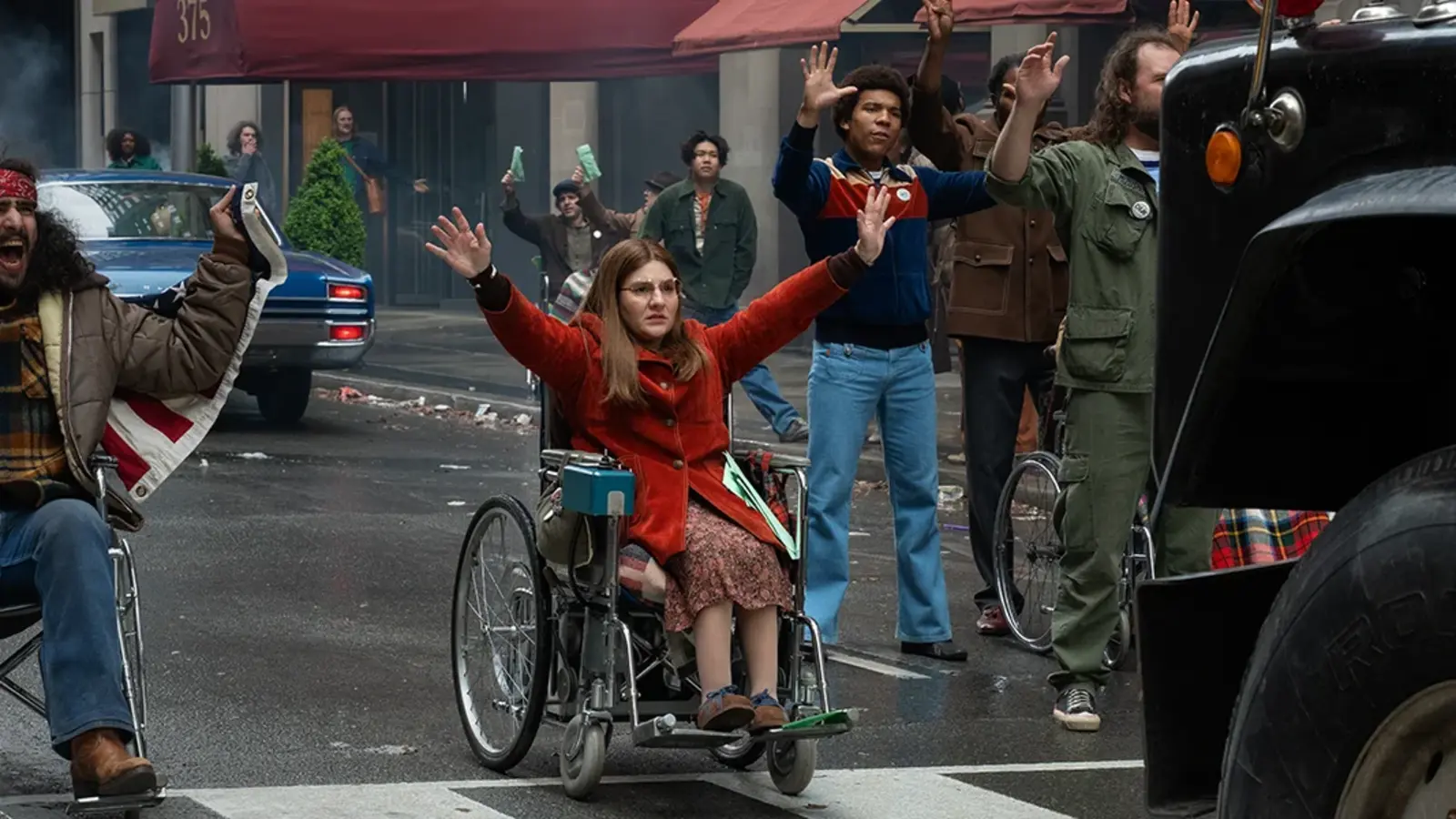 Judith Heumann supporters stop traffic in a scene from Being Heumann