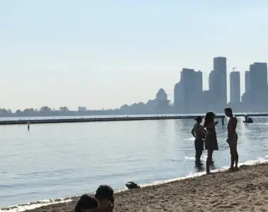 People swimming and relaxing at Sunnyside Beach