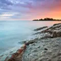 Colourful sunset above the rocky edge of Woodbine Beach