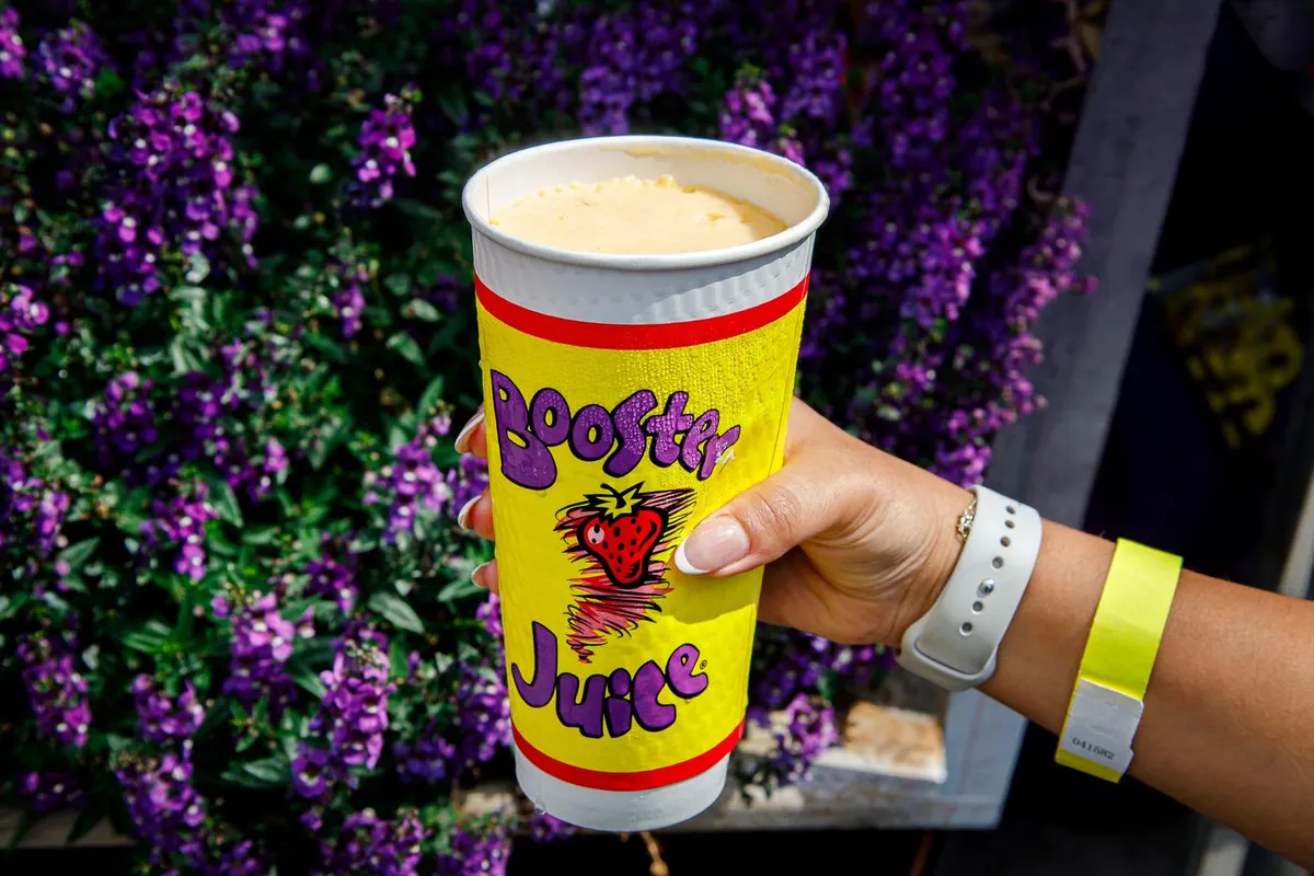 Yellow KD Smoothie served in a clear cup at the CNE