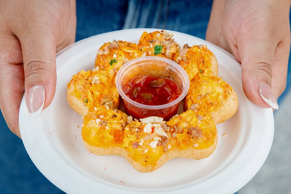 Nacho Affair mochi donut with cheese, bacon and tortilla chips