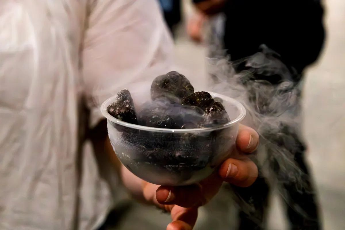 Nitrogen-frozen candy and ice cream bites served in a cup