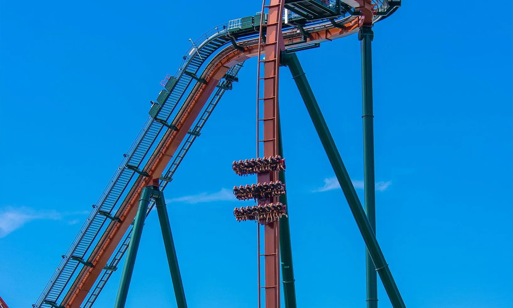 Riders hang above the first drop on Yukon Striker at Canada's Wonderland