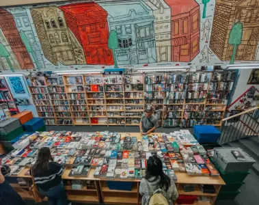Customers browsing books inside BMV Books Annex
