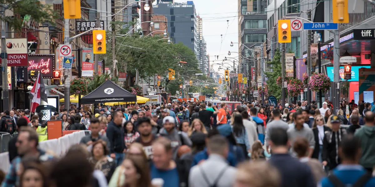 A large TIFF Festival Street crowd on King Street West in Toronto