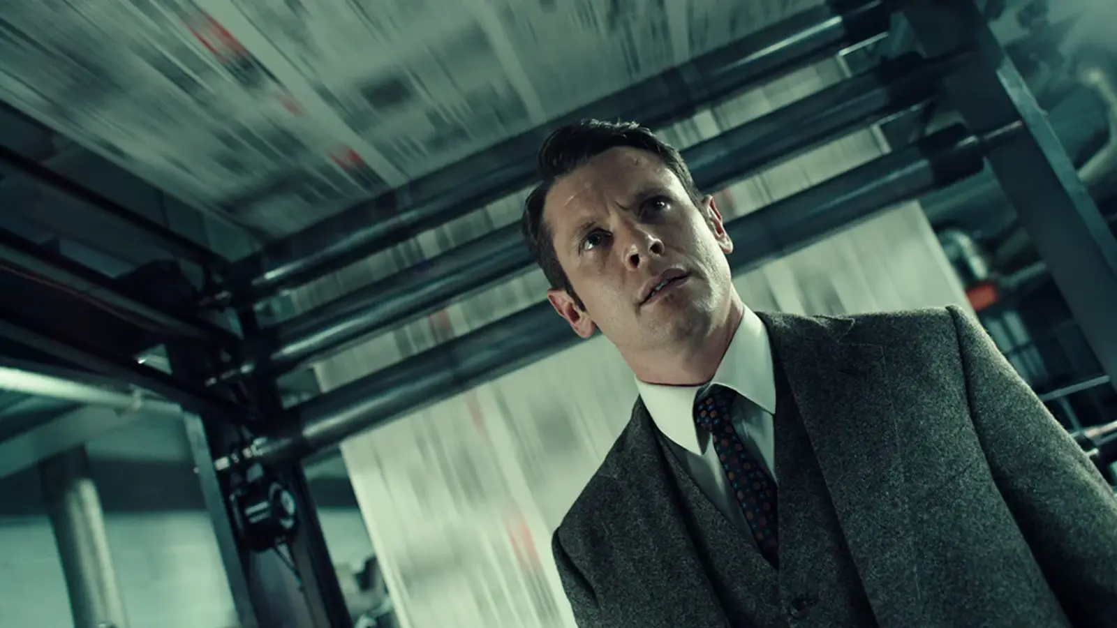 Jack O'Connell appears in a dimly lit scene from Ink
