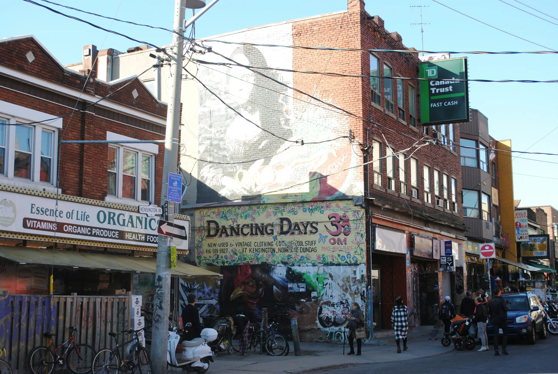Colourful street scene with shops and people in Kensington Market Toronto