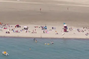 Aerial view of people swimming and relaxing at Woodbine Beach