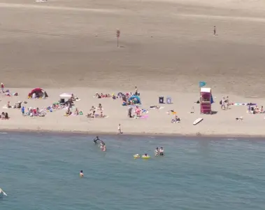 Aerial view of people swimming and relaxing at Woodbine Beach