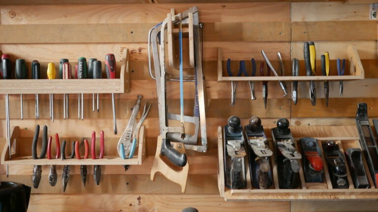Hand tools organized on a wall at Toronto Tool Library