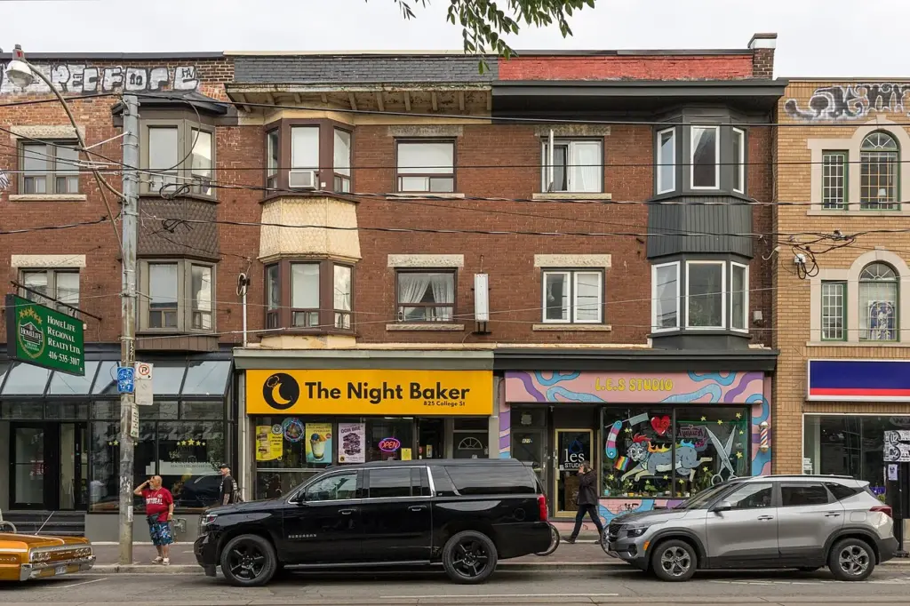 Small storefronts along College Street in Toronto