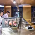 Open sushi counter and dining area inside Akira Back in Toronto