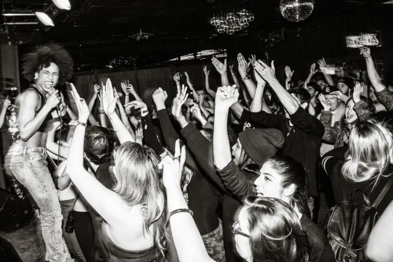 Crowd dancing during a live show at Drake Underground