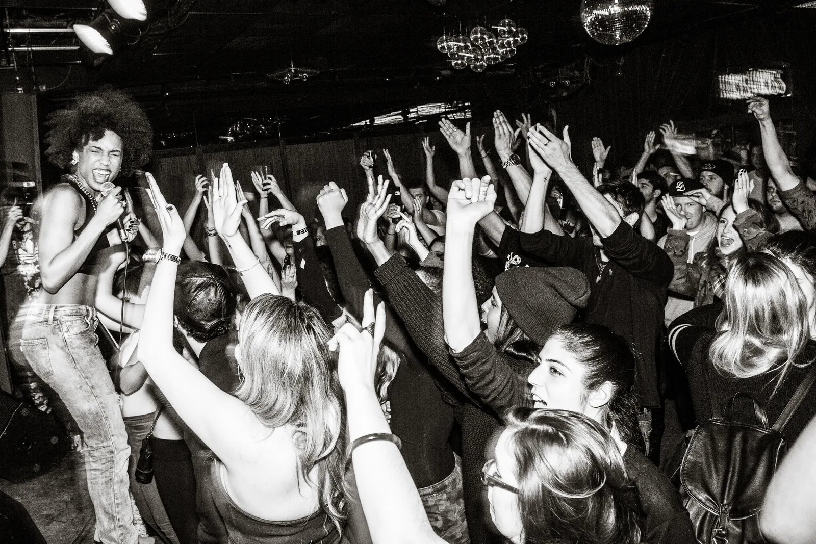 Crowd dancing during a live show at Drake Underground
