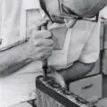 A Toronto Public Library worker restoring a book