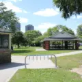 Washroom building, bike racks and a picnic shelter at Sir Casimir Gzowski Park