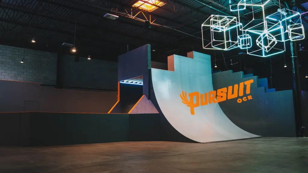 The branded ramp and obstacle area inside Pursuit OCR