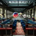 Sofas, rugs and tables in a soft seating area at Waterworks Food Hall