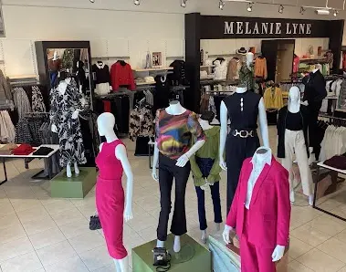 Dress displays inside Melanie Lyne in Woodbridge