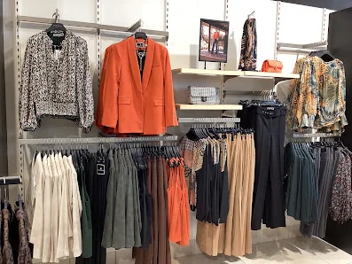Clothing displays inside Melanie Lyne in Woodbridge
