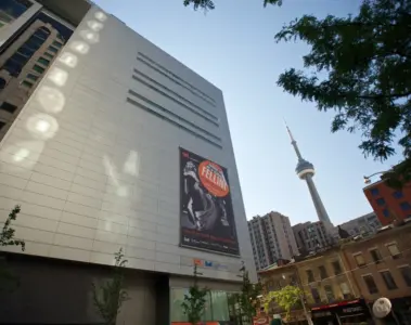 TIFF Lightbox exterior with the CN Tower visible behind it in downtown Toronto