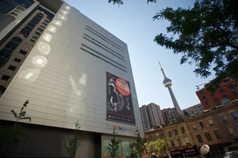 TIFF Lightbox exterior with the CN Tower visible behind it in downtown Toronto