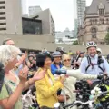 Olivia Chow stands with cyclists outside Toronto City Hall on the day she took office as mayor