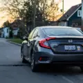 Honda Civic parked on a quiet Toronto residential street at sunset