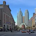 Cars, taxis and pedestrians on Front Street beside St. Lawrence Market