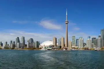 Wide daytime view of the Toronto skyline and CN Tower from Lake Ontario