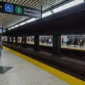 Passengers waiting on the Bloor-Yonge Station platform in Toronto