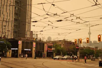 Orange wildfire haze over College Street and Spadina Avenue in Toronto