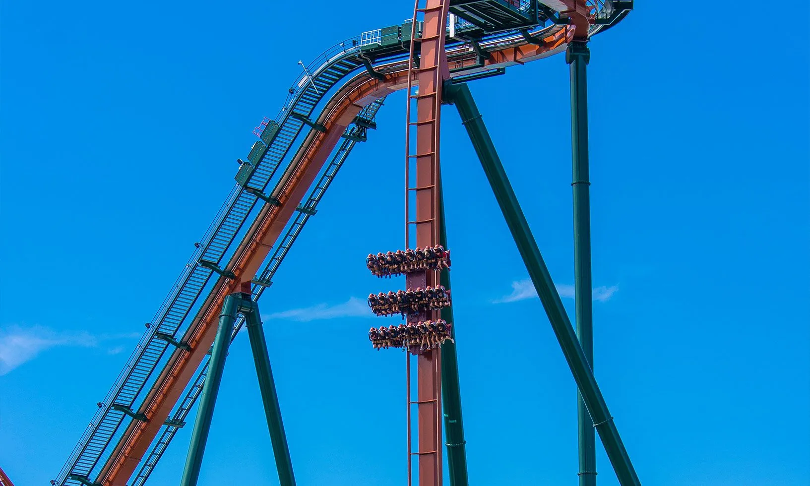 Riders hang above the first drop on Yukon Striker at Canada’s Wonderland