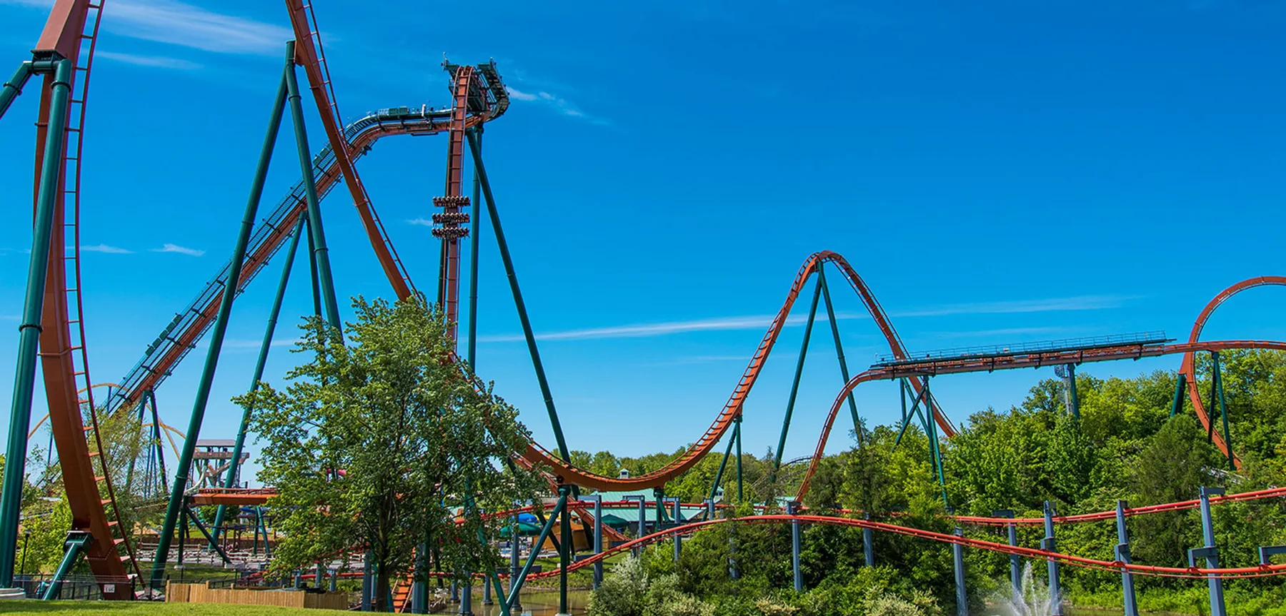 Yukon Striker roller coaster rises above Canada's Wonderland on a sunny day