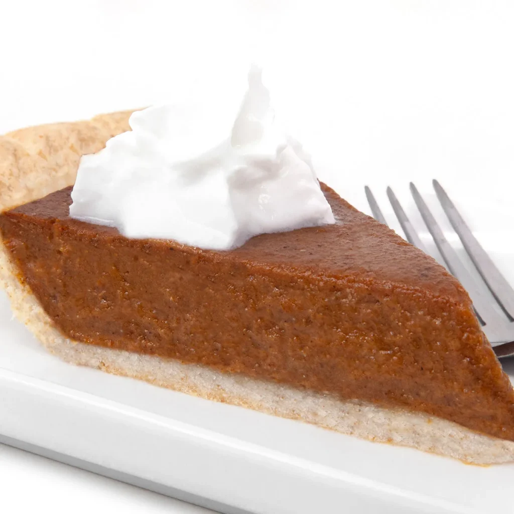 A slice of Bunner’s pumpkin pie with whipped topping