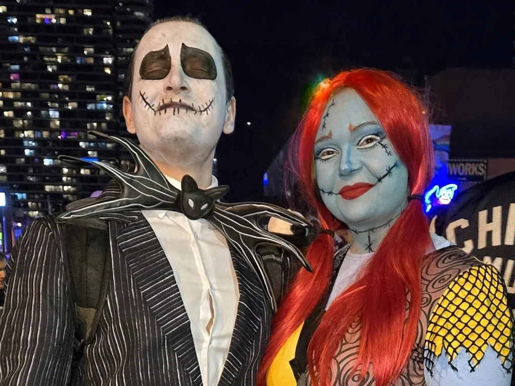 Visitors dressed as Jack Skellington and Sally at Halloween on Church