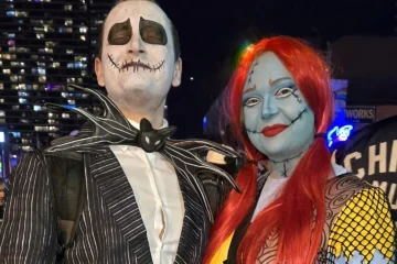 Visitors dressed as Jack Skellington and Sally at Halloween on Church