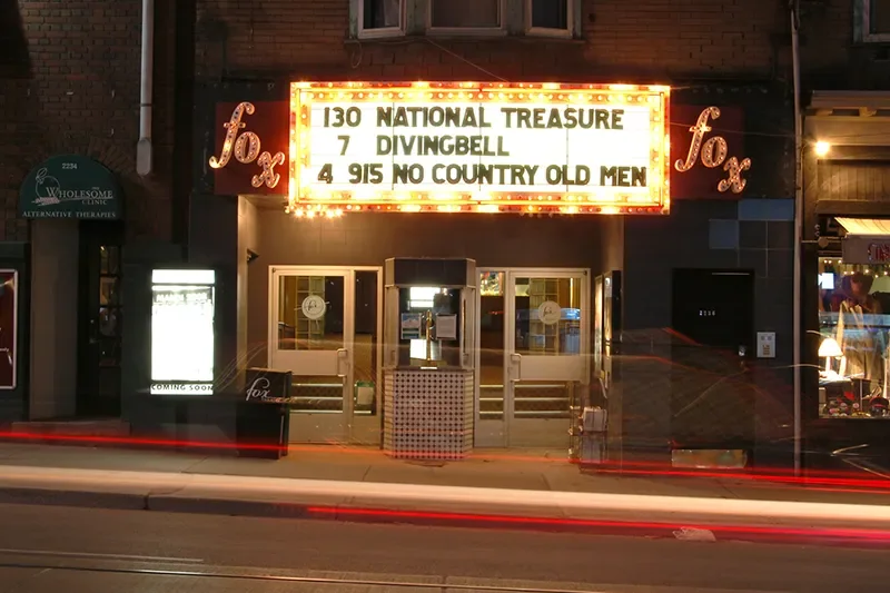 The illuminated Fox Theatre marquee on Queen Street East at night