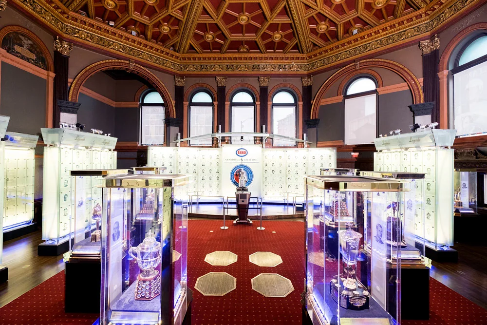The stained-glass dome and trophy displays in the Hockey Hall of Fame’s Great Hall