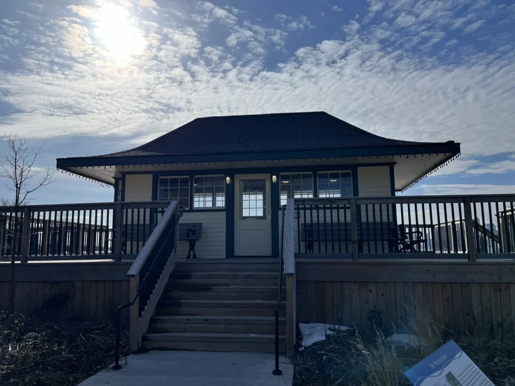 The blue and white waiting shed beside Ward’s Island ferry dock