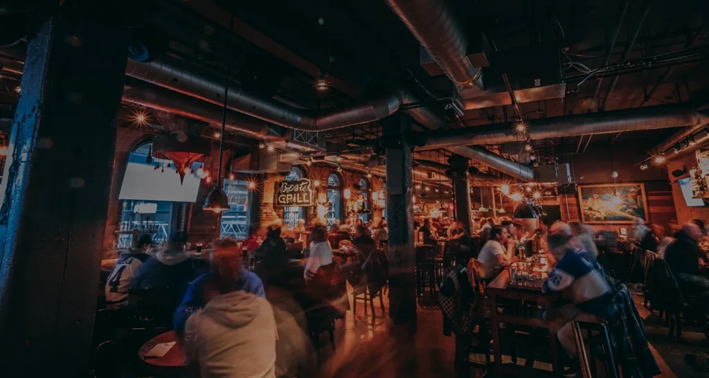 Tables, television screens and guests inside The Loose Moose