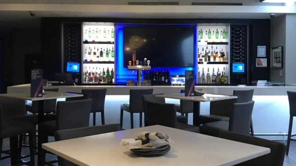 The bar and television screens in the Varsity VIP lounge
