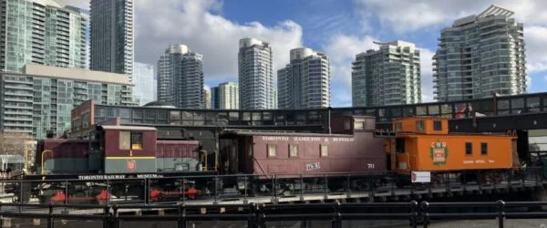 Historic railway vehicles displayed outside Toronto’s roundhouse