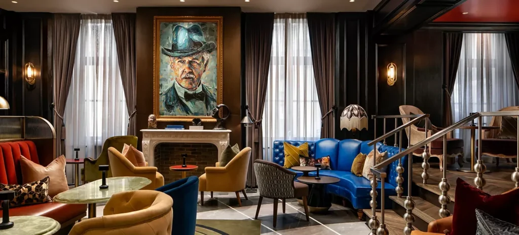 Portrait and lounge seating inside Library Bar