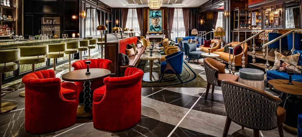 Red chairs and dark wood inside Library Bar at Fairmont Royal York